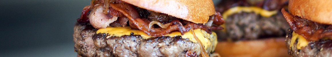 Eating Burger at Broiler Bay Hamburgers restaurant in Bellevue, WA.